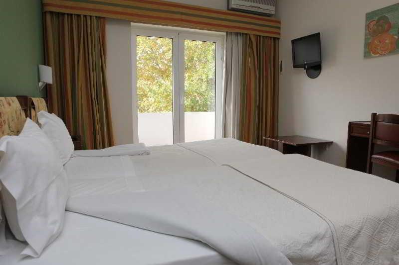 Petrus Hotel Кавес Стая снимка